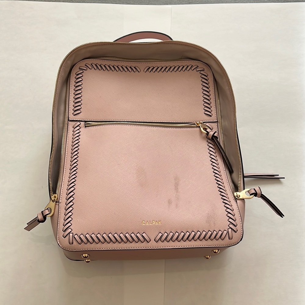 Blush pink calpak laptop backpack